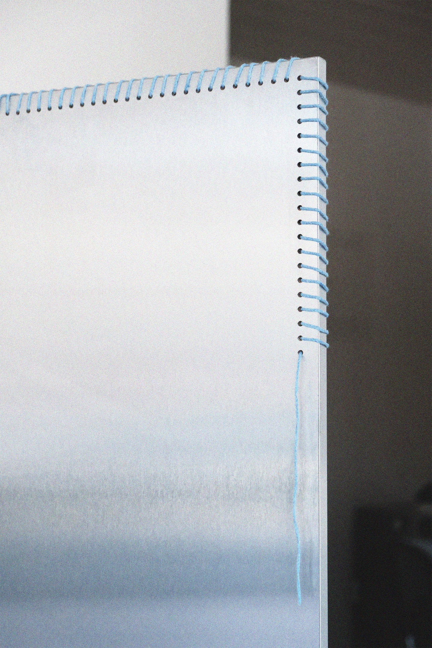 Stitched Steel Divider